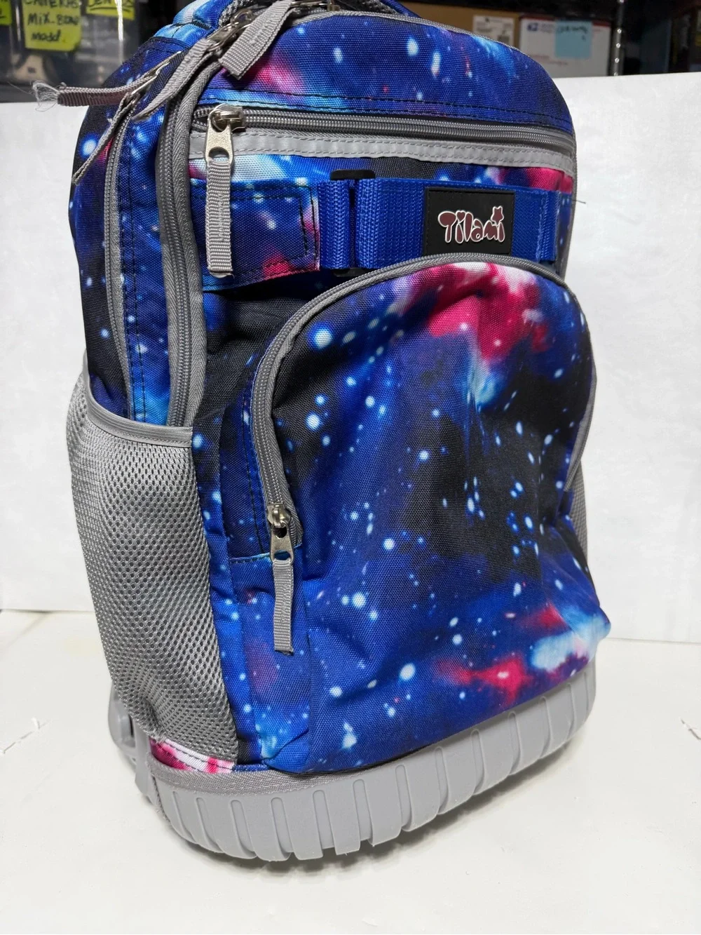 Tilami Deep Blue Galaxy Rolling Backpack 19 inch - pre owned condition